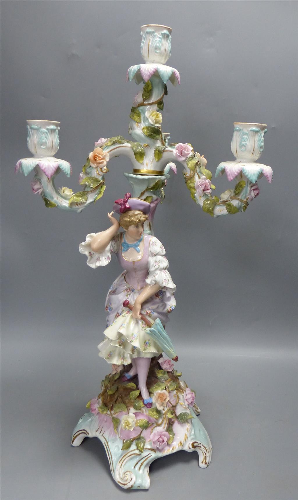 A pair of early 20th century Plaue porcelain figural candelabra, overall height 48cm